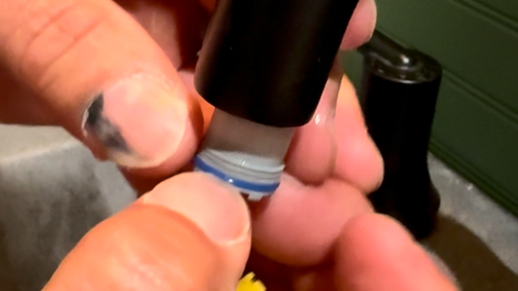 Low flow faucet step 2 clean the screen